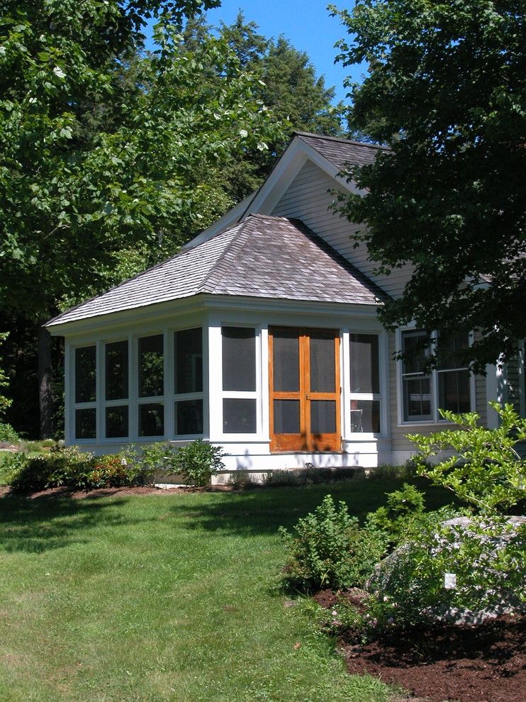 A1 Mulch for a Traditional Porch with a Screened in Porch and Screened Porch by by Design