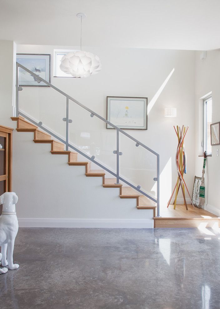 Acid Stained Concrete for a Contemporary Entry with a Concrete Floor and Hoffmanresidence Staircase by Kailey J. Flynn Photography