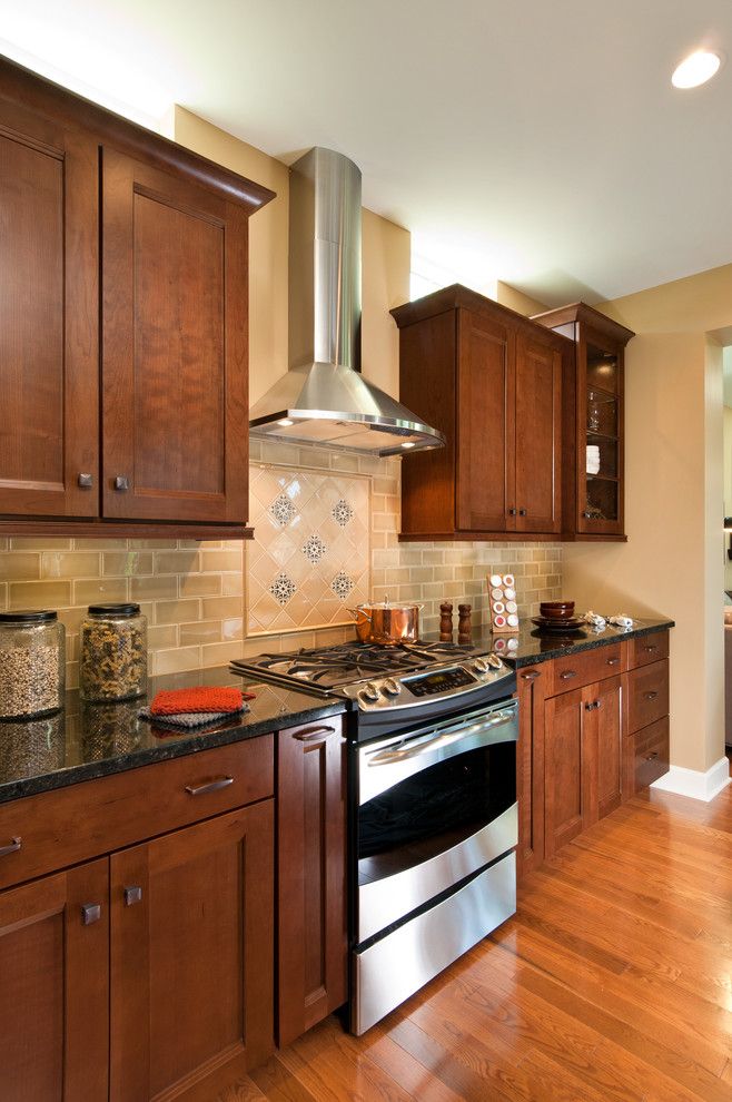 Acid Stained Concrete for a Traditional Kitchen with a Harvest Bend and 2012 Saratoga Showcase Home by Belmonte Builders