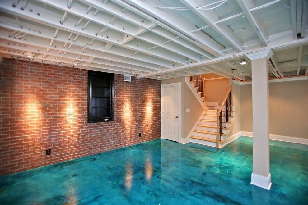 Acid Wash Concrete for a Contemporary Basement with a Painted Joists and Lake House by Jac Design