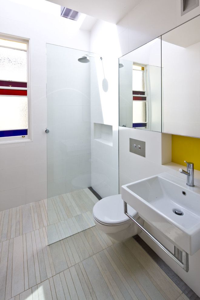 Ada Bathroom Layout for a Contemporary Bathroom with a Yellow Splashback and the 'Escher' House by Maccormick & Associates Architects