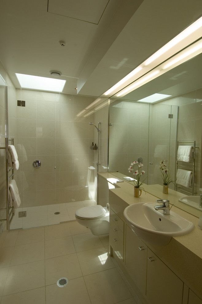 Ada Bathroom Layout for a Modern Bathroom with a Recessed Lighting and Penthouse Master Bath by Frederick Gibson + Associates Architecture