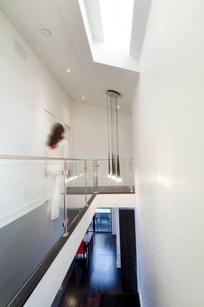 Ags Stainless for a Modern Hall with a Ceiling Lighting and House 99 by Modus Design Studio