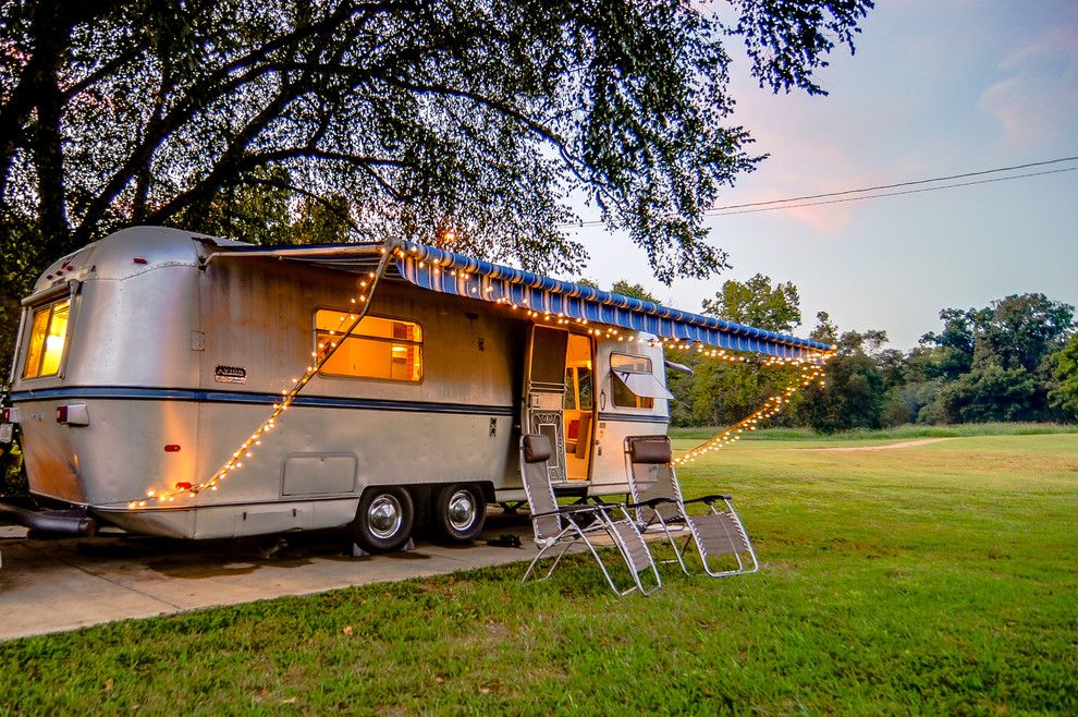 Airstream Renovation for a Midcentury Exterior with a Glamping and '72 Avion Camper Renovation by William Johnson Architect