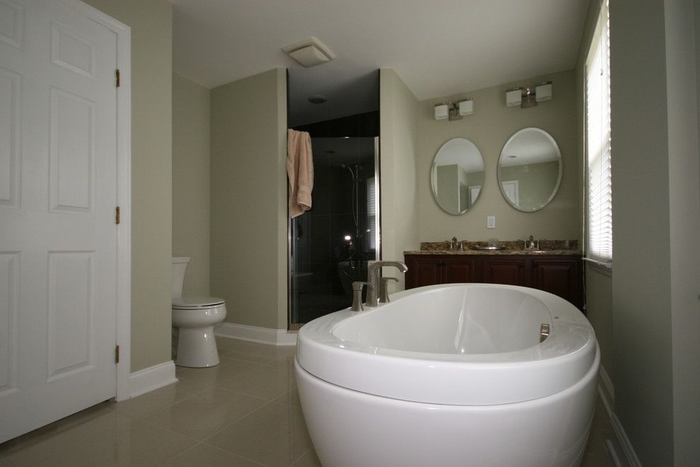 Aker Tubs for a Contemporary Bathroom with a Contemporary and Dao House by Evolved Interiors and Design Showroom