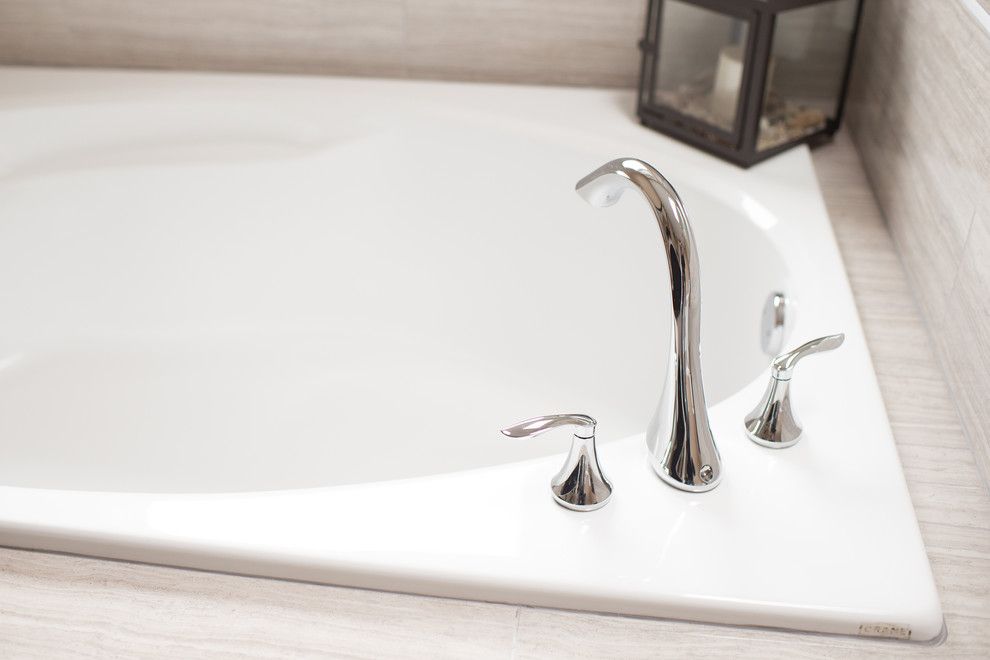 Aker Tubs for a Contemporary Bathroom with a His Hers Bathroom Sinks and Rich Transformation by Alderidge Construction Ltd.