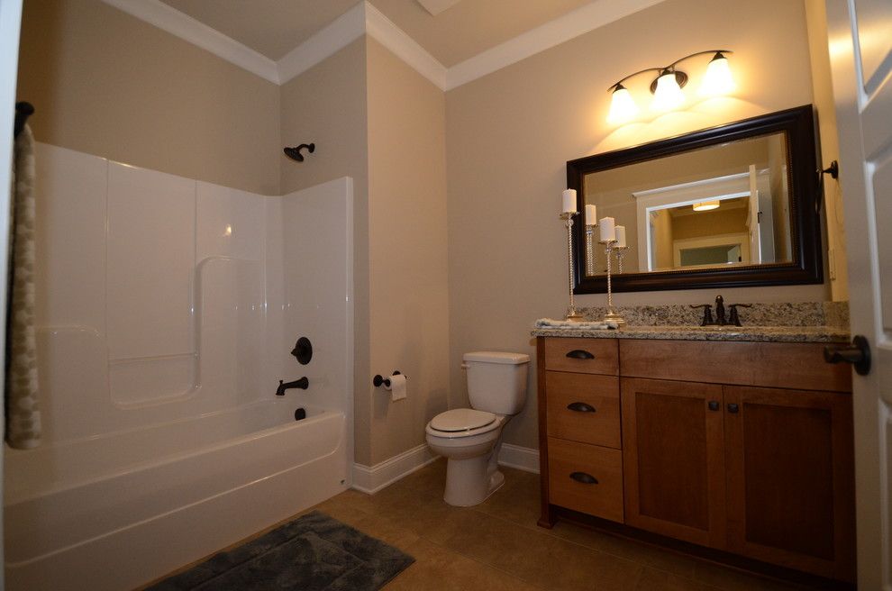 Aker Tubs for a Traditional Bathroom with a Shaker Style and Secondary Bath by Twickenham Homes & Remodeling