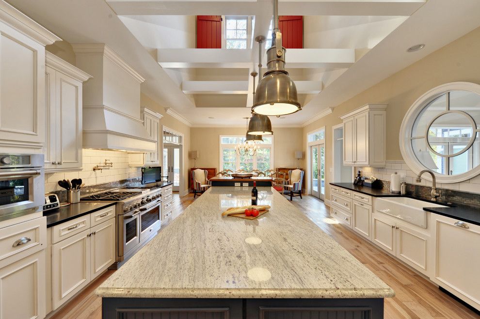 Alaska White Granite for a Beach Style Kitchen with a White Cabinets and Kitchen by Echelon Custom Homes