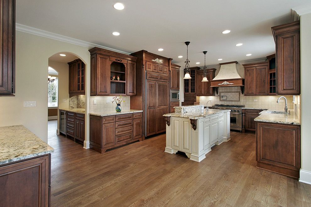 Alaska White Granite for a Traditional Kitchen with a Granite Countertop and Alaska White Granite Countertop with Travertine Back Splashes by Virtual Warehouse