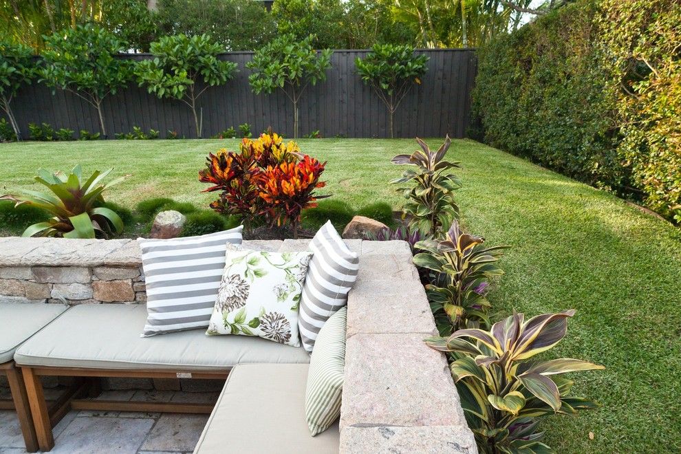 Alpine Fence for a Tropical Landscape with a Landscaping and Cooparoo 3 by Utopia Landscape Design