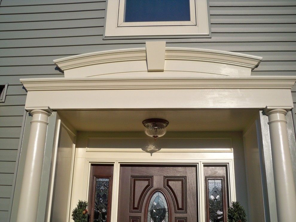 Alside for a Traditional Exterior with a Traditional and Vinyl Siding with Custom Azek Entry Trim. by Blue Tree Builders, Llc