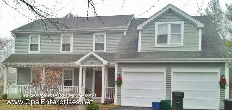 Alside for a Traditional Exterior with a Vinyl Siding and Alside Centerlock Vinyl Siding, White Trim & New Front Door by Opal Enterprises Inc