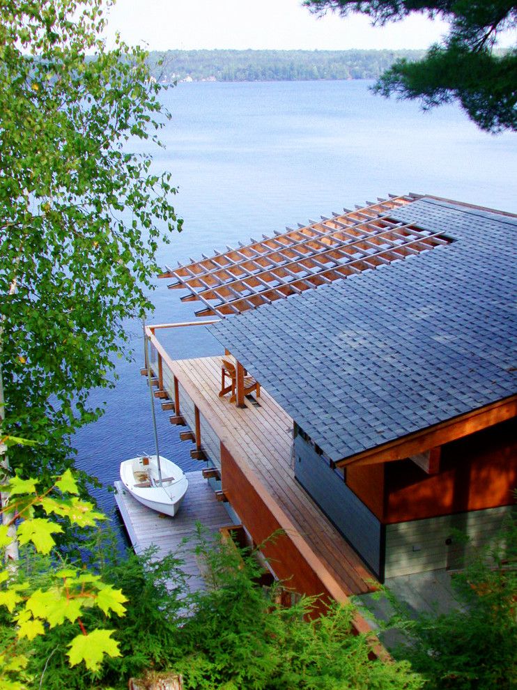 Altius for a Rustic Exterior with a Boathouse and Acton Island Boathouse by Altius Architecture, Inc.