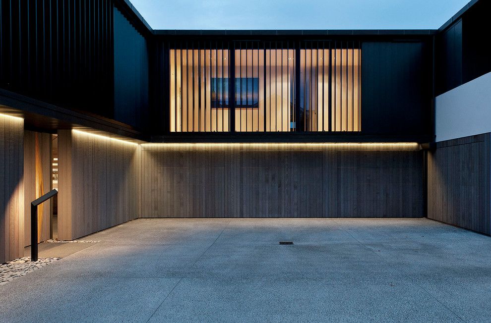 Amarr Garage Doors for a Contemporary Exterior with a Courtyard and Lucerne by Daniel Marshall Architect