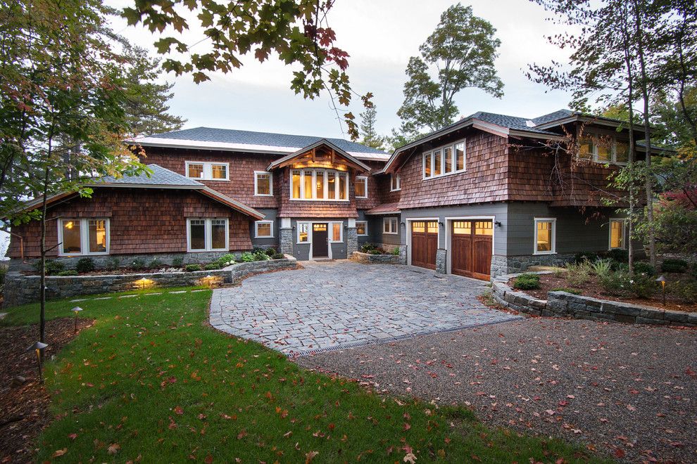 Amarr Garage Doors for a Rustic Exterior with a Cedar Siding and Great Camp by Phinney Design Group