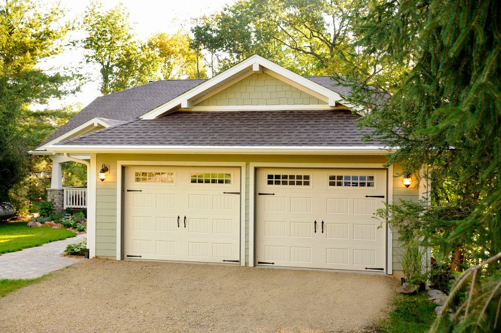 Amarr Garage Doors for a Traditional Garage with a Strap Hinge and 2 Car Garage by Jg Development, Inc.