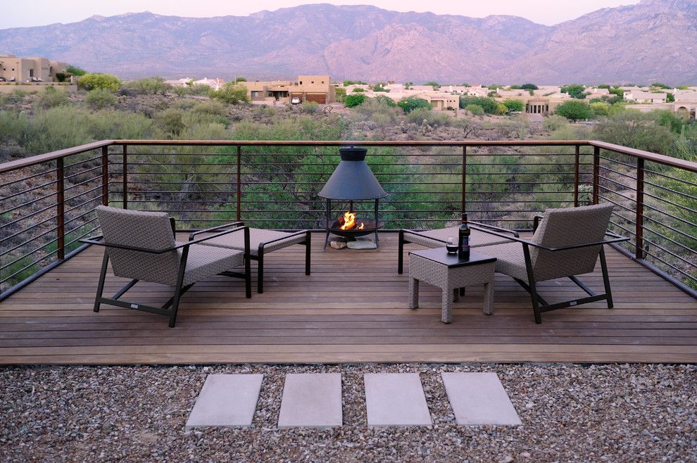 Ambiente Furniture for a Contemporary Deck with a Elevated Deck and Deck Over the Desert by Prideaux Design