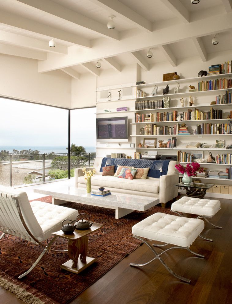 Ambiente Furniture for a Midcentury Living Room with a Side Table and Living Room by Laidlaw Schultz Architects