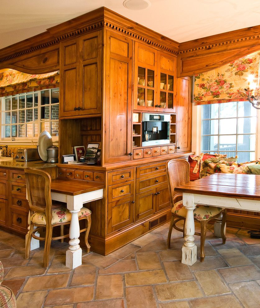 American Rattan for a Traditional Kitchen with a Glass Front Cabinets and Custom Built in Breakfast Room by Hostetler Custom Cabinetry