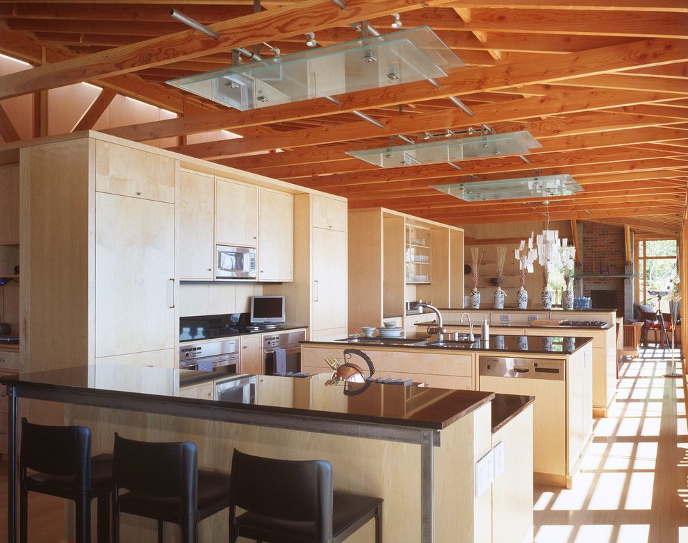 Anderson Plywood for a Industrial Kitchen with a Exposed Rafters and Our Work by Fairbank Construction Company