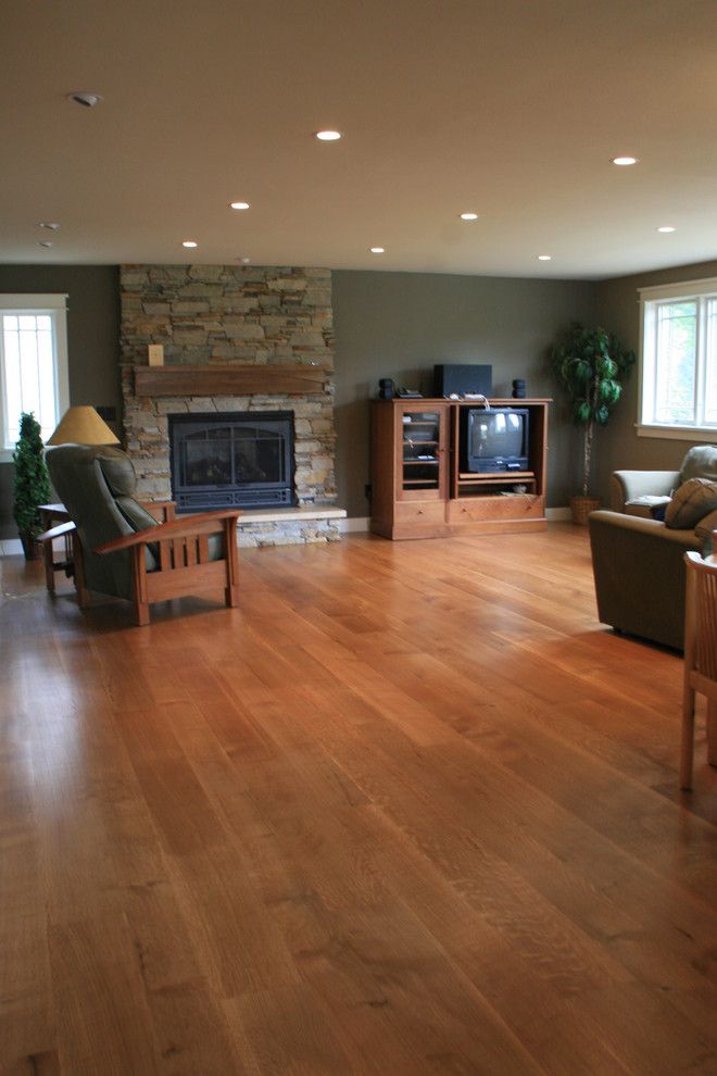 Anderson Plywood for a Modern Family Room with a Recliner and Wide Plank White Oak Floor by Magnus Anderson Hardwood Floors