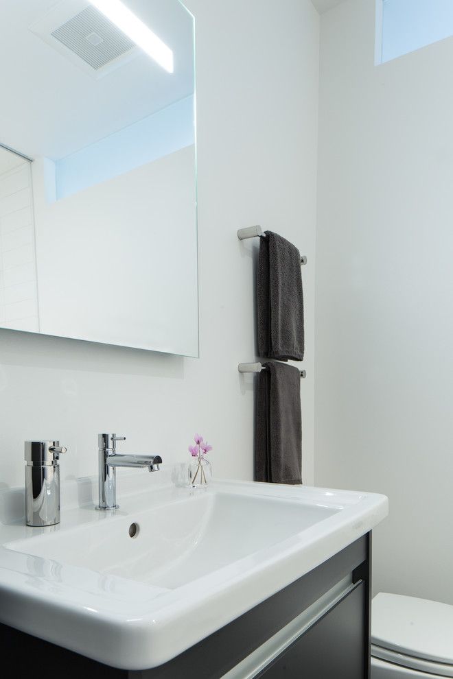 Aquabrass for a Modern Bathroom with a Duravit Vanity and Flotoma Drive Renovation by Maryellen Kowalewski Architect