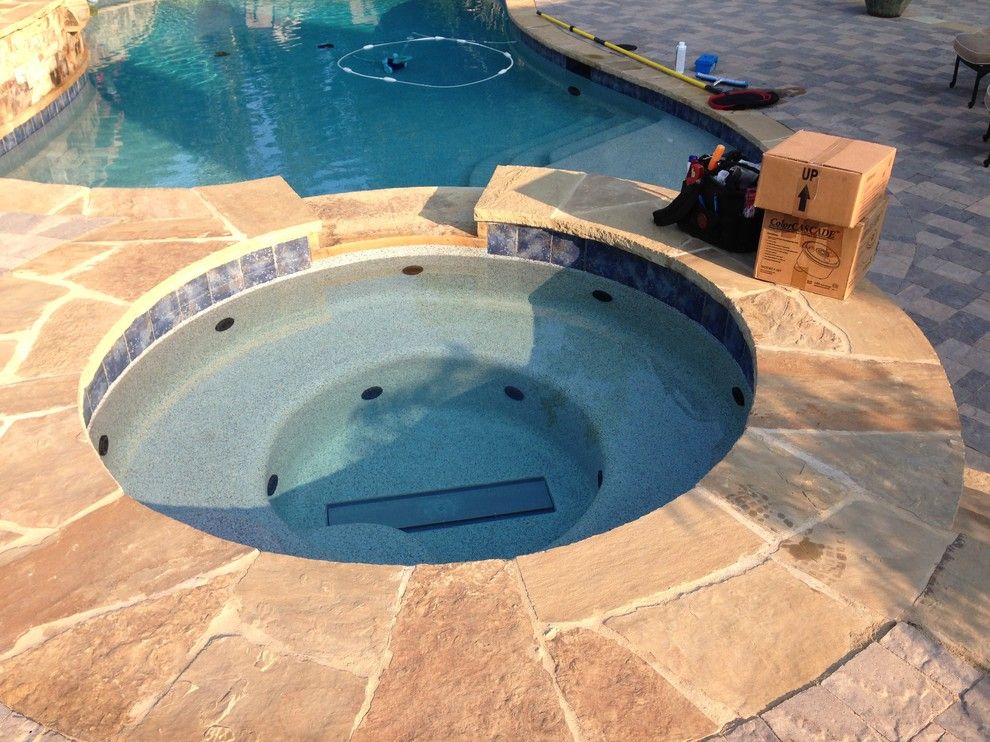 Aquarama for a Traditional Pool with a Waterfall and Luca Pool Build by Aquarama Pools & Spas