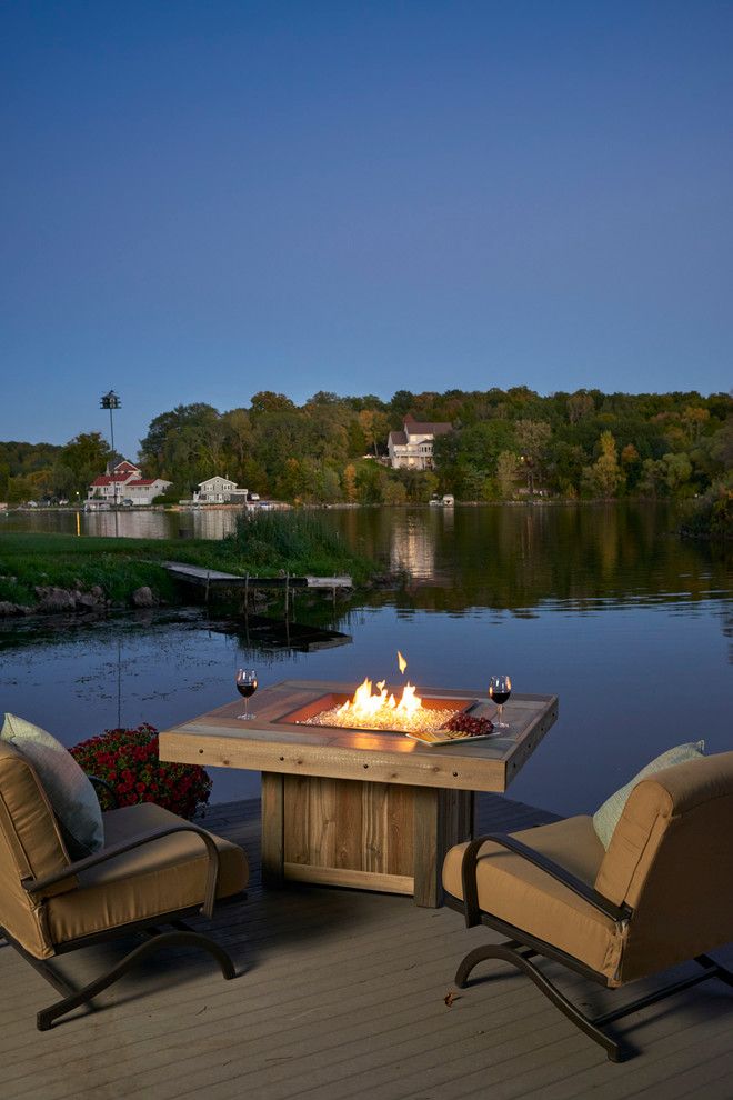 Arcadia Furniture for a  Spaces with a Dock and Lake View Outdoor Room by the Outdoor Greatroom Company