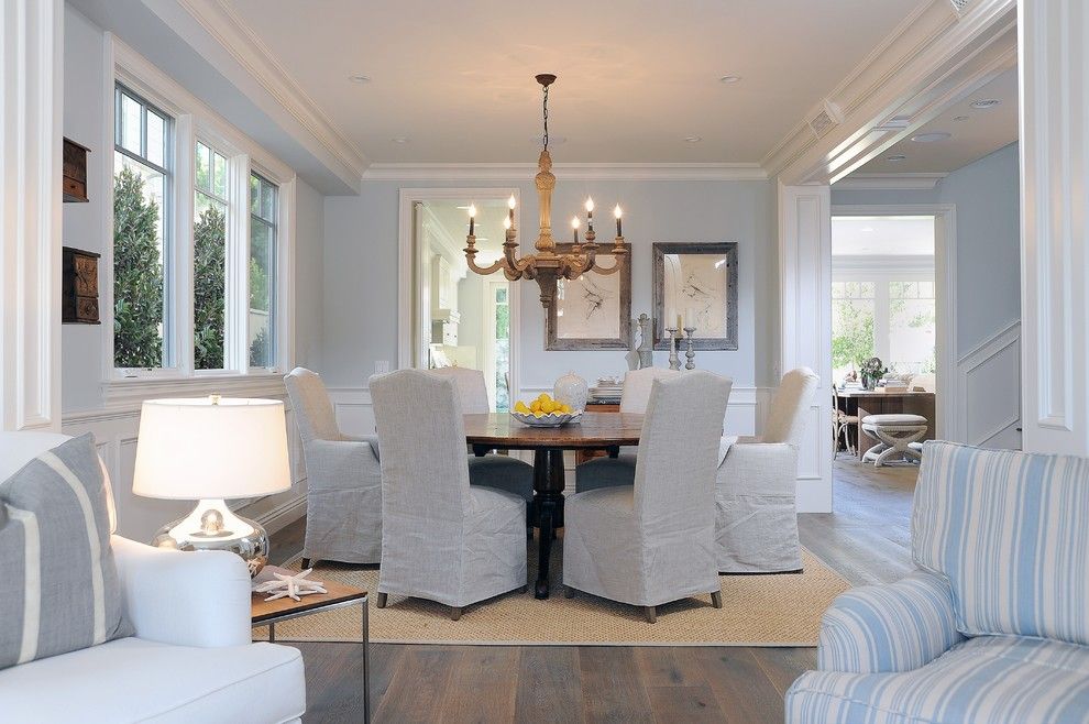 Architrave for a Beach Style Dining Room with a Slipcovers and Living and Dining Room by Dtm Interiors