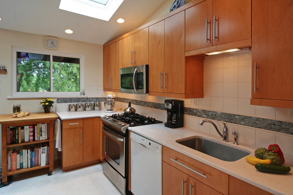 Armstrong Cabinets for a Contemporary Kitchen with a Tile Kitchen Backsplash and Mid Century Modern Ranch Kitchen Remodel by Mosby Building Arts