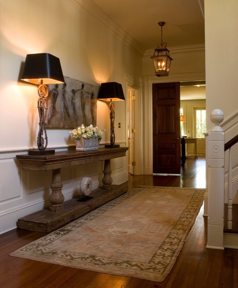 Arteriors Home for a Traditional Entry with a Crown Molding and Historic Downtown by Haute Design