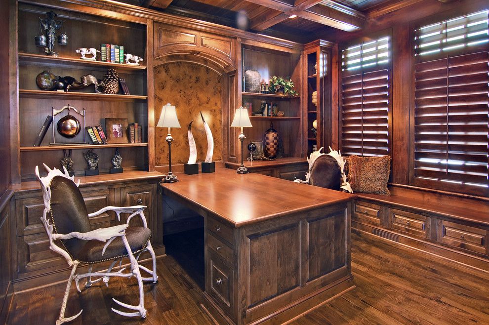 Arteriors Home for a Traditional Home Office with a Built in Shelves and Home Office by John Kraemer & Sons