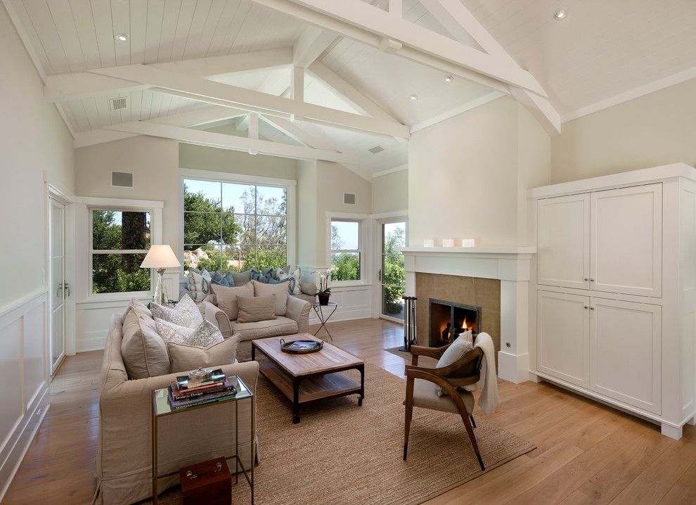 Arteriors Home for a Traditional Living Room with a White Armoire and East Mountain by Dd Ford Construction