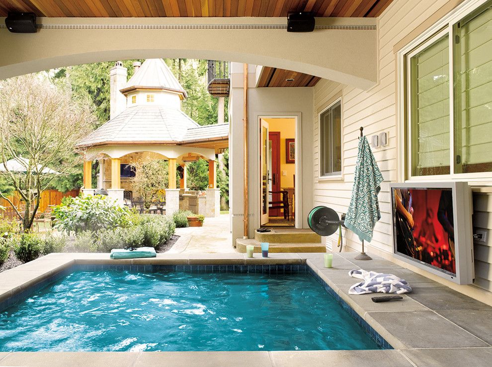 Artistic Pavers for a Craftsman Pool with a Outdoor Space and Outdoor Spaces by Magnolia Design Center