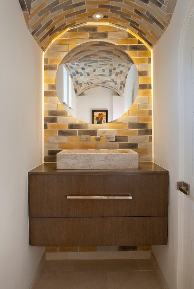 Arto Brick for a Contemporary Powder Room with a Sink and Caruth by Tatum Brown Custom Homes