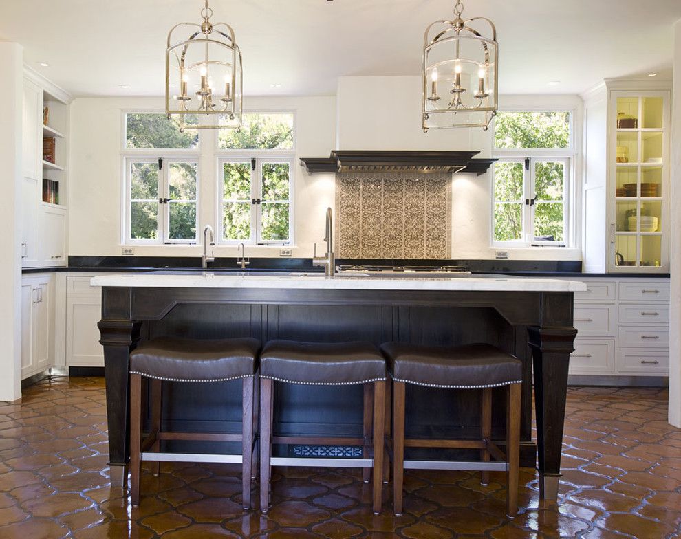 Arto Brick for a Mediterranean Kitchen with a Dark Stain and Montecito Residence by Lori Smyth Design