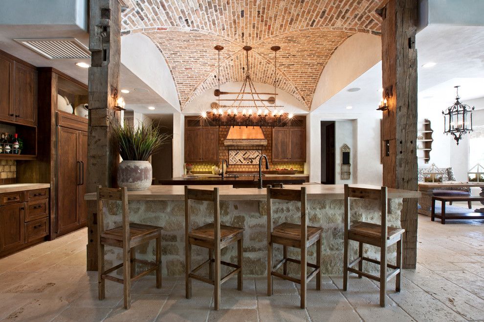 Arto Brick for a Mediterranean Kitchen with a Vaulted Ceiling and Tuscan Farmhouse by Eklektik Interiors