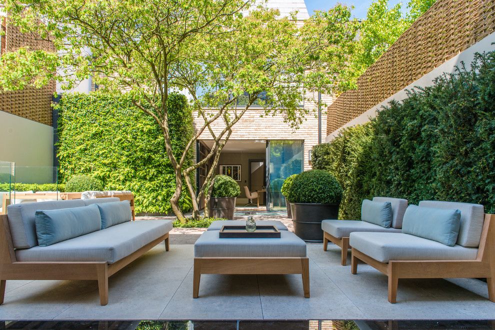 Ashley Furniture Reno for a Contemporary Patio with a Garden Sofa and Notting Hill House by Nash Baker Architects