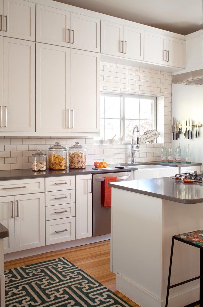 Ashley Norton Hardware for a Transitional Kitchen with a Black and White Rug and Lo Hi Residence by Ashley Campbell Interior Design