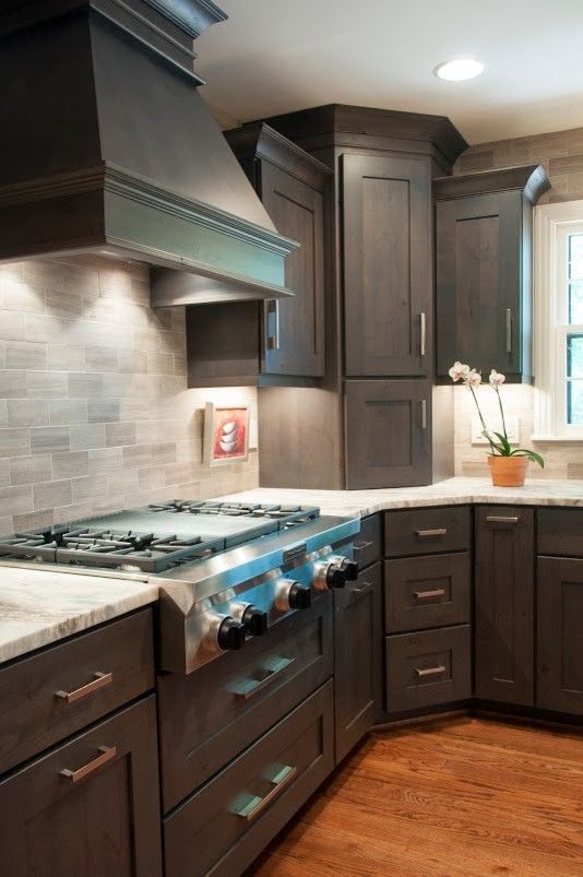 Ashley Norton Hardware for a Transitional Kitchen with a Dark Stain and Handsome in Alder by Terri Sears, Kitchen and Bath Designer