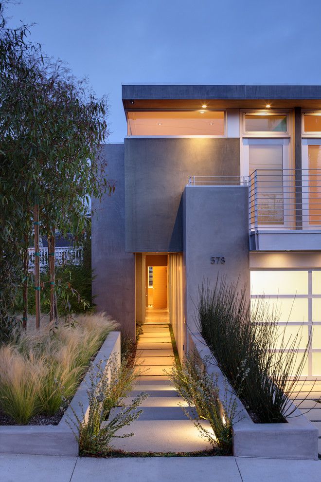 Asphalt vs Concrete for a Contemporary Exterior with a Minimalism and Oliveras by Kkc Fine Homes