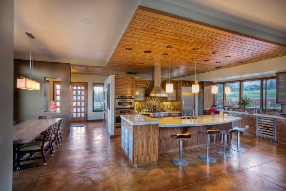 Asphalt vs Concrete for a Contemporary Kitchen with a Kitchen Island and Kitchen by Carlos Delgado Architect