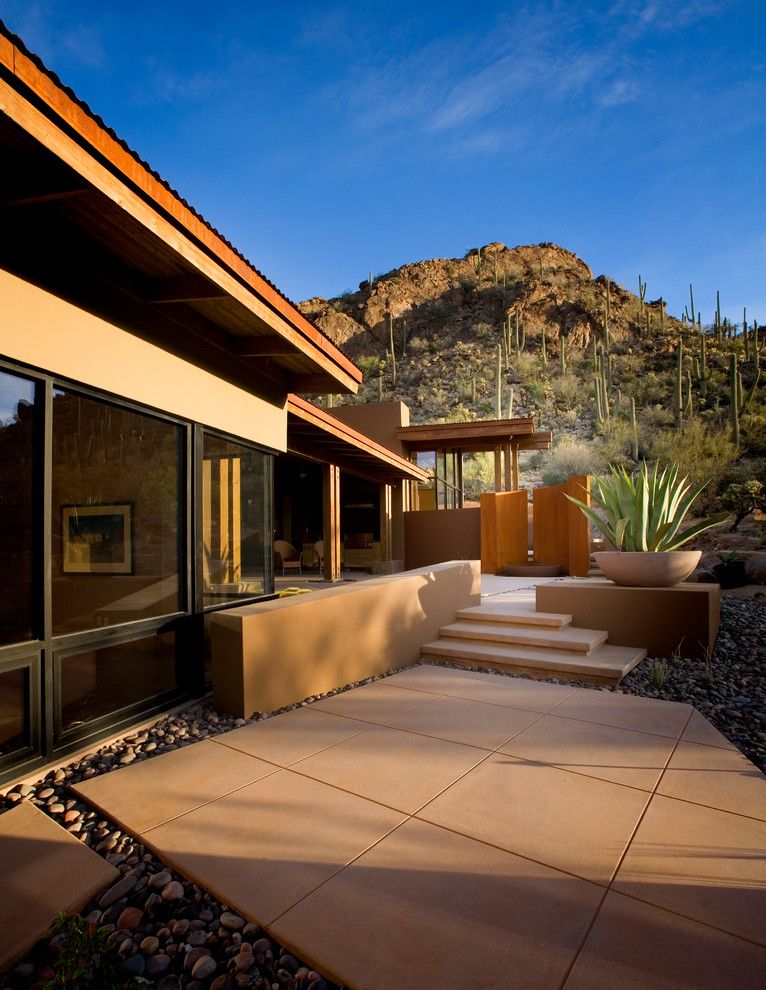 Asphalt vs Concrete for a Southwestern Patio with a Rusted Steel and Rancho Nuevo by Bianchi Design