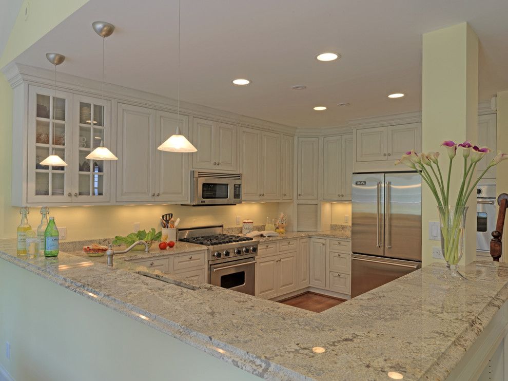 Astoria Granite for a Traditional Kitchen with a Wood Cabinets and Case Design/remodeling, Inc. by Case Design/remodeling, Inc.