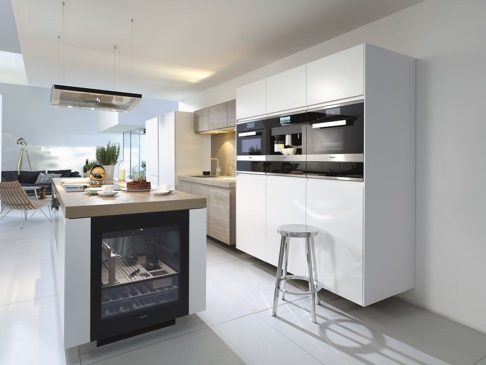 Atherton Appliance for a Modern Kitchen with a Wine Refrigerator and Miele by Miele Appliance Inc