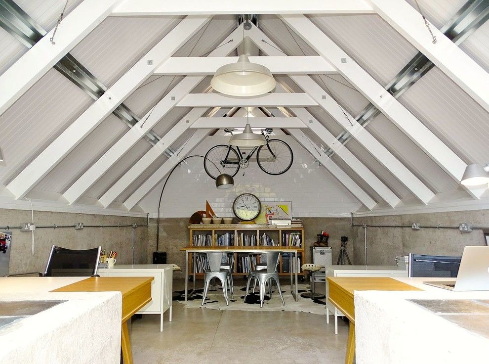 Attic Truss for a Industrial Home Office with a Wooden Desk and Walkid Home Studio by Walk Interior Architecture & Design