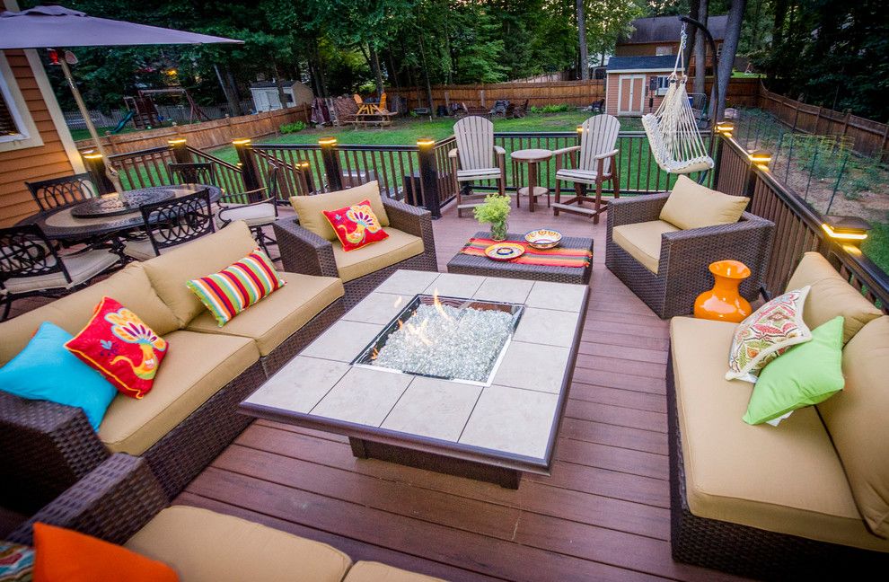 Babettes Furniture for a Contemporary Deck with a Fire Feature and Patios and Decks by Razzano Homes and Remodelers, Inc.