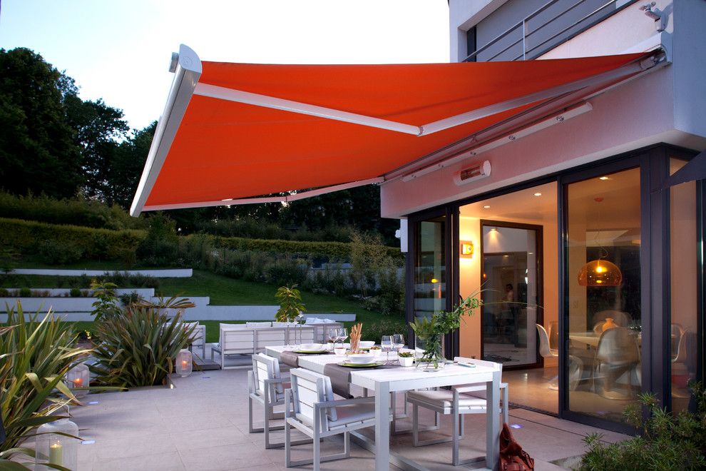 Bacons Furniture for a Modern Patio with a Retractable Awning and Somfy by Somfy