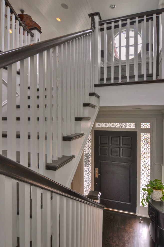 Ballister for a Traditional Staircase with a Wood Banister and Freestone Residence by Luann Development, Inc.