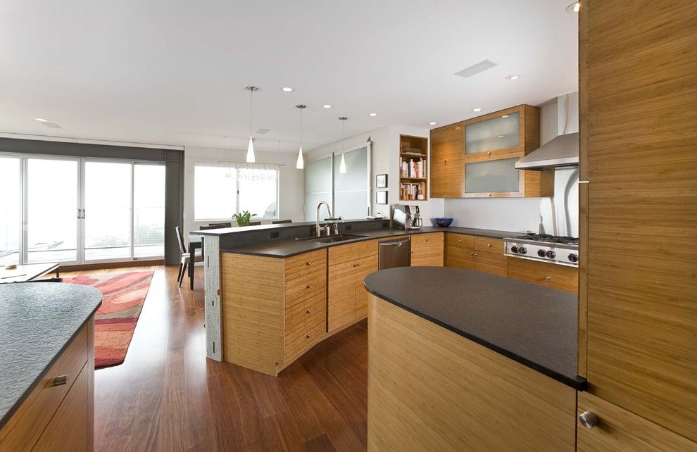 Bamboo vs Hardwood for a Contemporary Kitchen with a Caesarstone Countertops and Kitchen by Mark English Architects, Aia